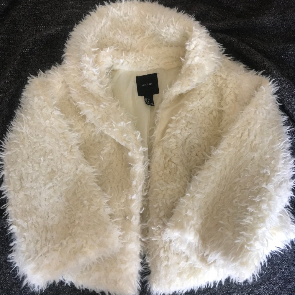 White faux fur coat